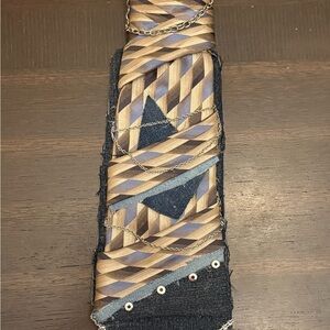 Geometric Patterned Junk Tie with Chain Detail